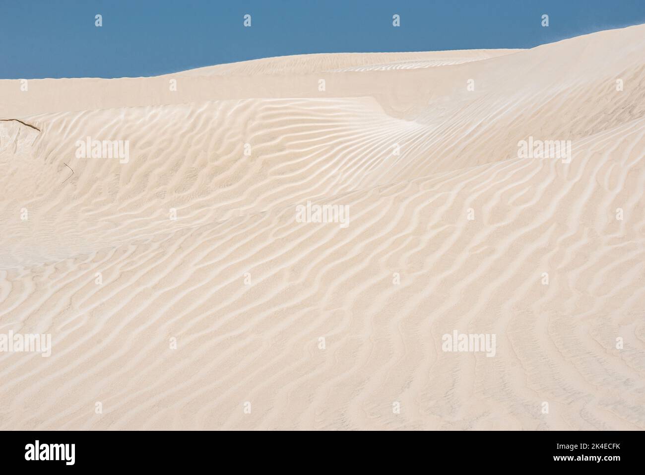 Blinding white Sugar Dunes near al-Khaluf, Oman Stock Photo