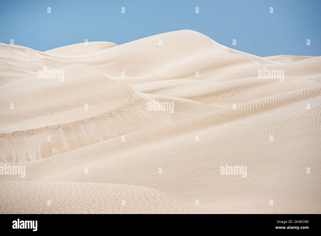 Blinding white Sugar Dunes near al-Khaluf, Oman Stock Photo