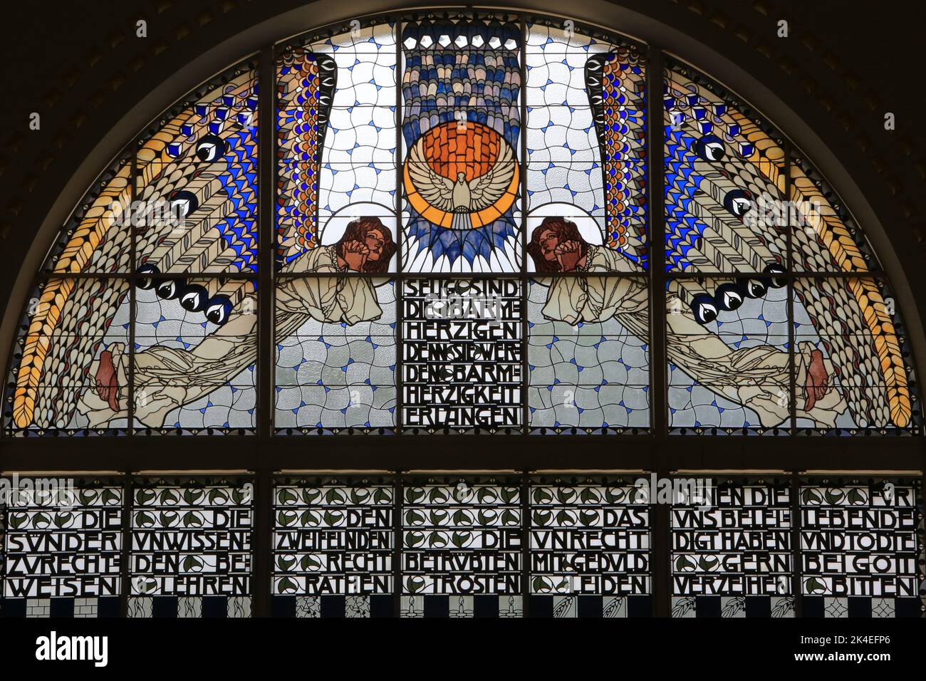 Holy Spirit. Mercy. Stained glass by Kolo Moser. Am Steinhof Church of St. Leopold built by Otto Wagner between 1902 and 1907. Vienna. Austria. Europe Stock Photo