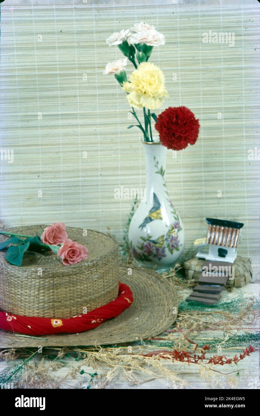 Dry Flower Arrangement on a Hat on the Mat Stock Photo