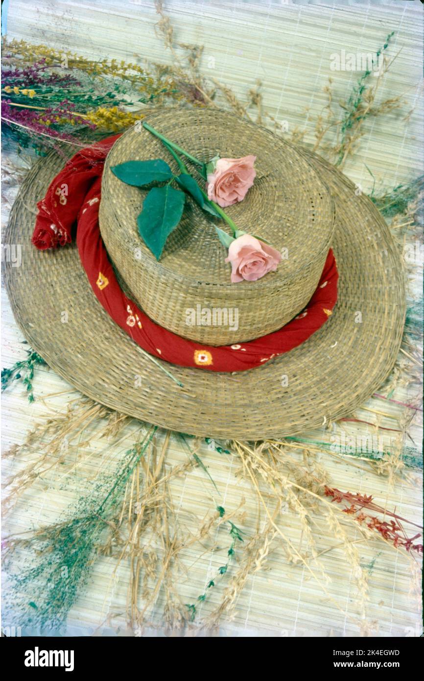 Dry Flower Arrangement on a Hat on the Mat, India. Stock Photo