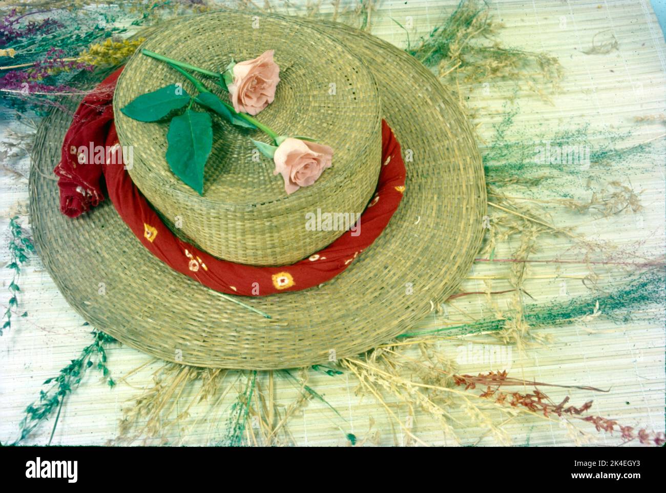 Dry Flower Arrangement on a Hat on the Mat, India. Stock Photo