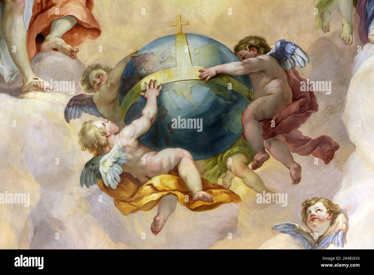 Three little angels holding the globe. Fresco of Johann Michael Rottmayr on the dome. Karlskirche. Church of St. Charles Borromeo. Vienna. Austria. Eu Stock Photo