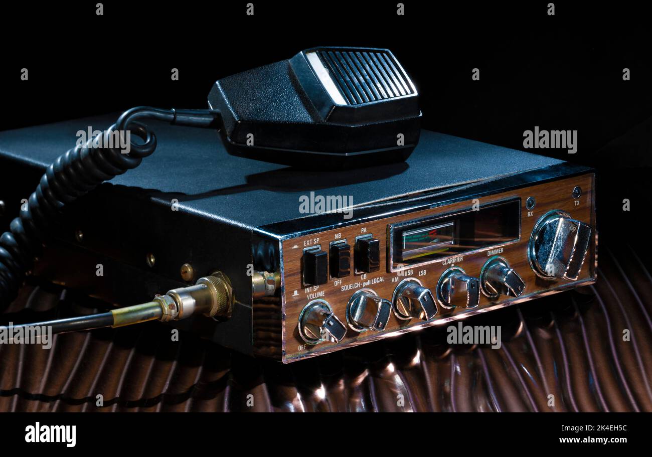 CB radio that runs on sideband on a bronze and wavy surface Stock Photo