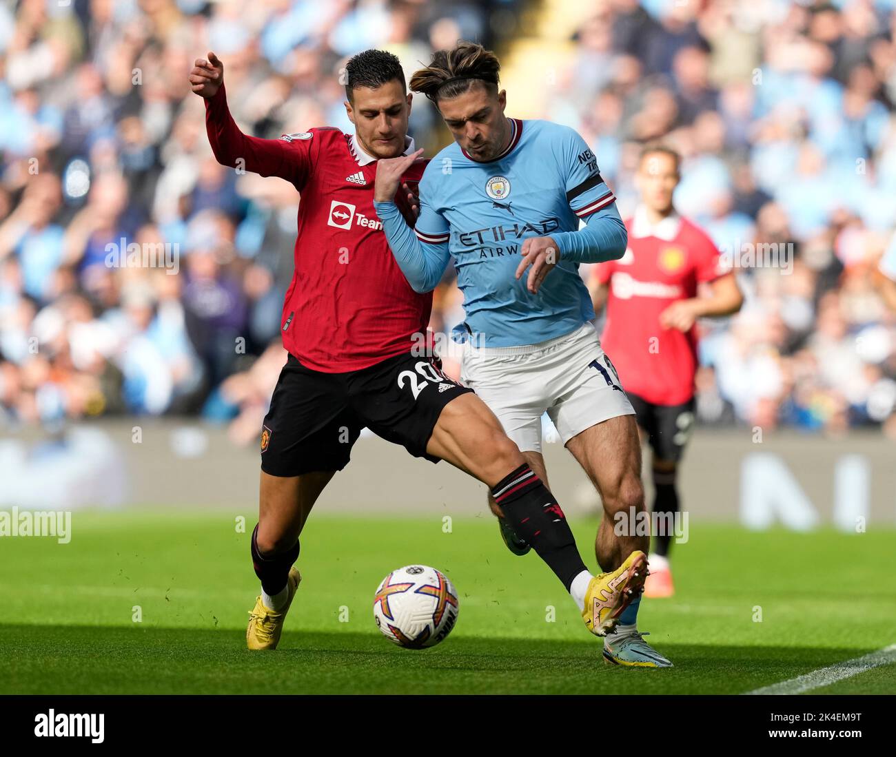 Manchester, England, 2nd October 2022. Diogo Dalot of Manchester United challenges Jack Grealish of Manchester City  during the Premier League match at the Etihad Stadium, Manchester. Picture credit should read: Andrew Yates / Sportimage Stock Photo