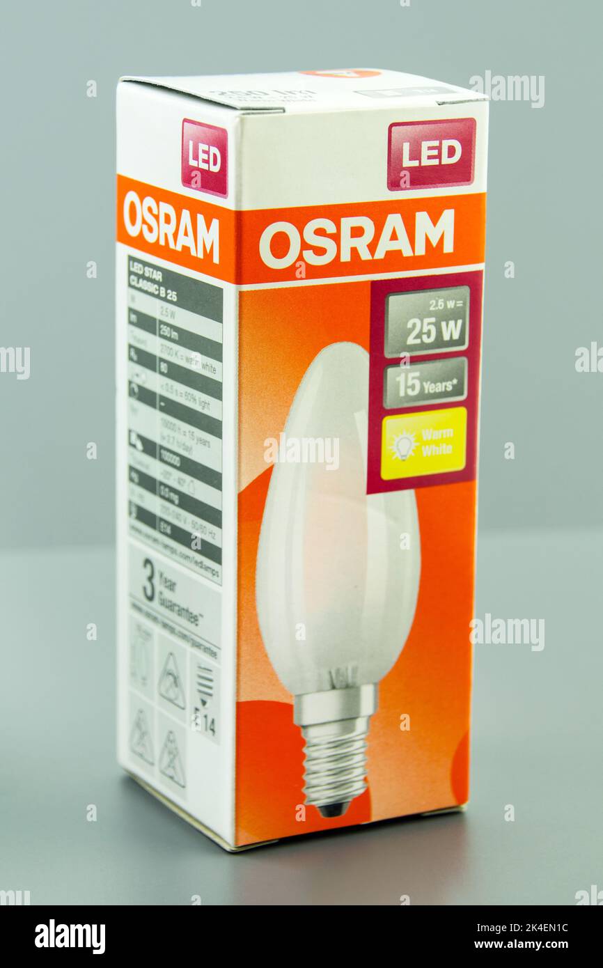 Hamburg, Germany - September 25  2022: Osram LED Glühbirne 25 Watt mit Karton close up - Osram LED light bulb 25 watts with cardboard box close up Stock Photo