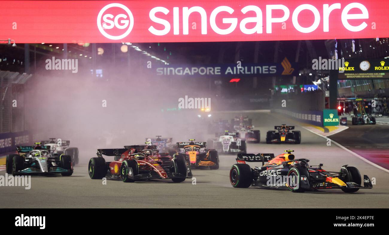Formula One F1 - Singapore Grand Prix - Marina Bay Street Circuit, Singapore - October 2, 2022 Red Bull's Sergio Perez in action as he leads at the start of the race REUTERS/Edgar Su Stock Photo