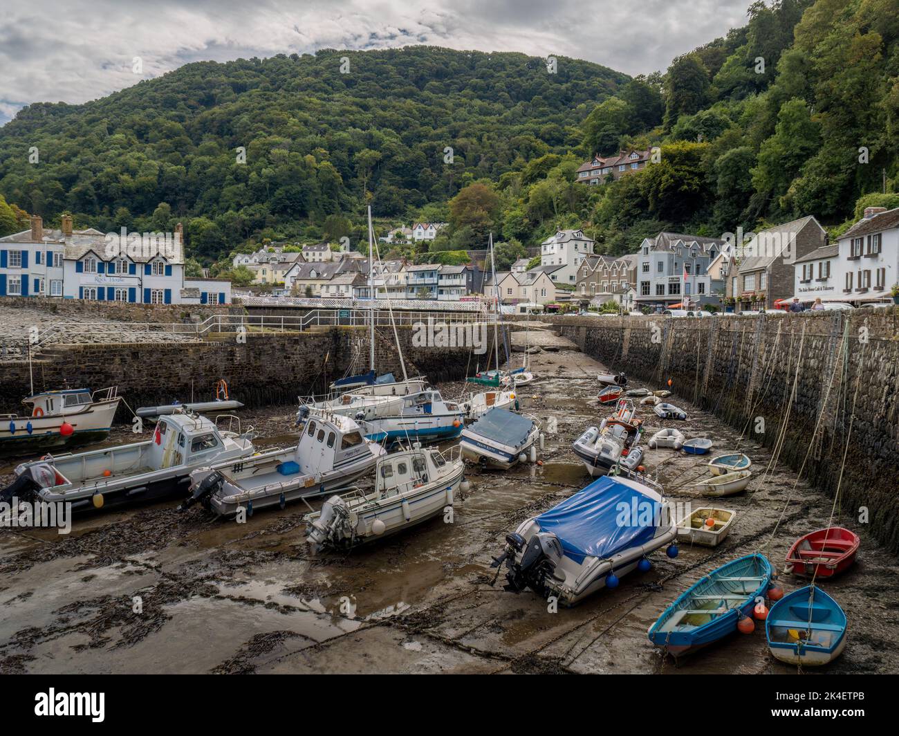 LYNMOUTH, DEVON, SEPTEMBER 11 2022: Boats in Lynmouth harbour at low tide. Stock Photo