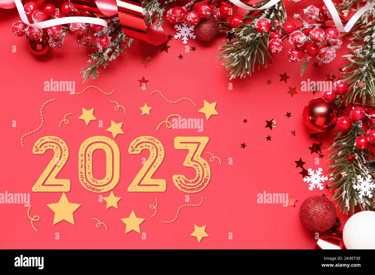 New Year greeting card with beautiful baubles and fir branches on red ...