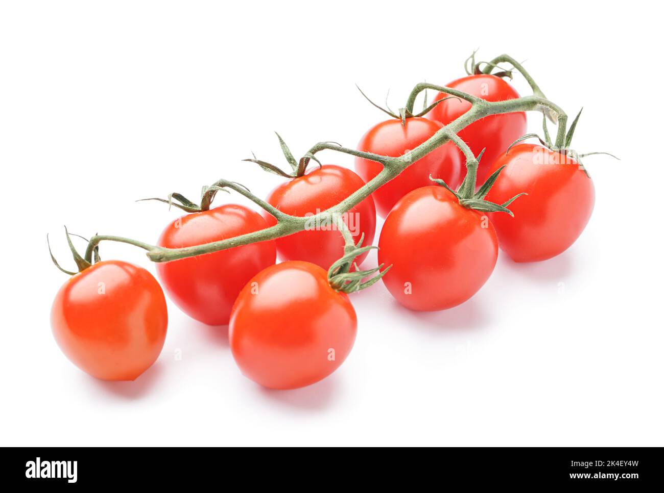 Bunch of ripe tomatoes isolated on white background Stock Photo - Alamy