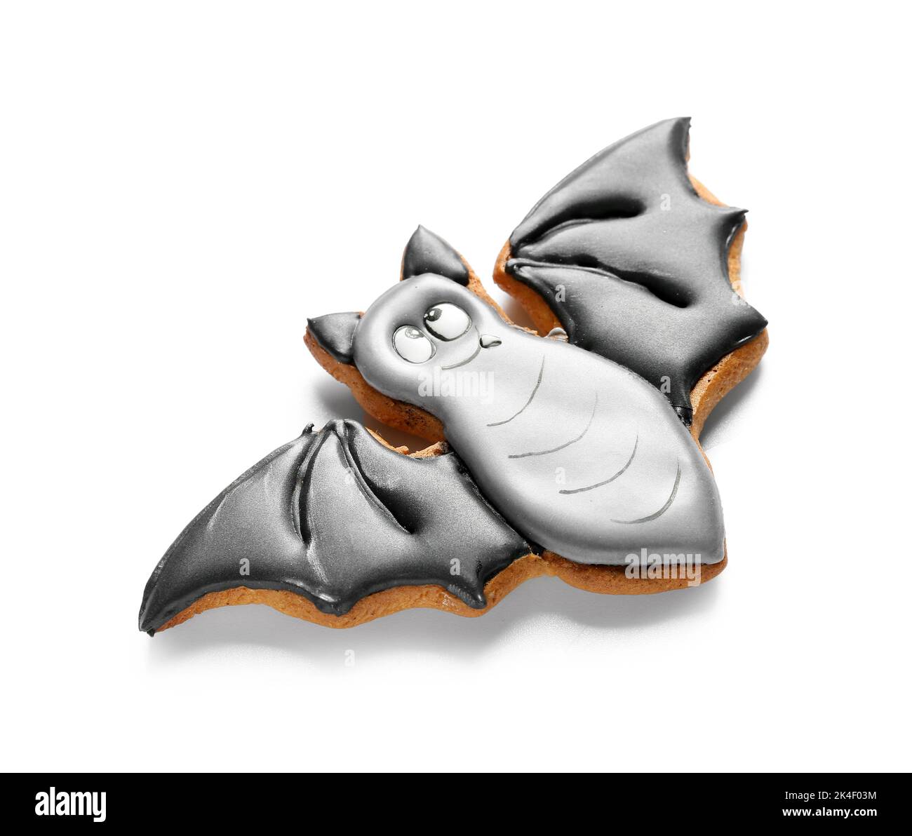 Halloween bat cookie on white background Stock Photo - Alamy