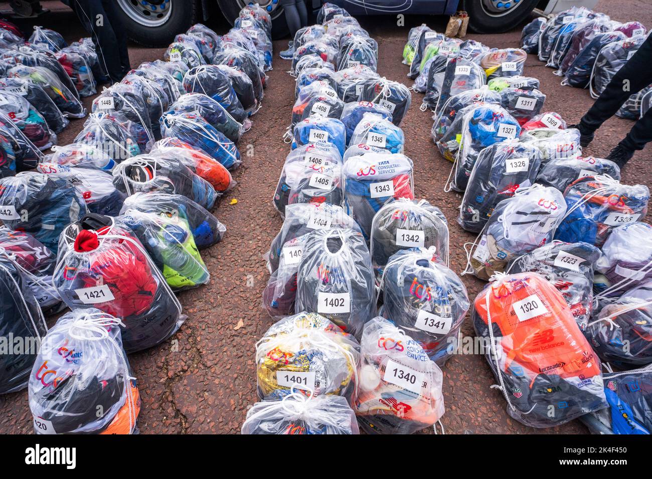 London UK. 2 October 2022 .  Thousands of baggage  belonging to marathon runners are tagged and numbered at The Mall for collection after the race  as more than  40,000 participants including elite runners took part in the London Marathon over a 26.2 mile course. than Credit: amer ghazzal/Alamy Live News. Stock Photo