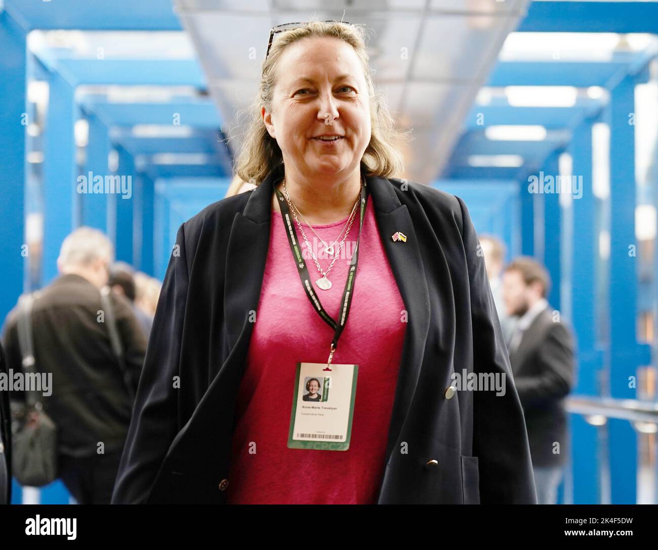Secretary of State for Transport Anne-Marie Trevelyan, walks across the Hyatt hotel bridge at the Conservative Party annual conference at the International Convention Centre in Birmingham. Picture date: Sunday October 2, 2022. Stock Photo