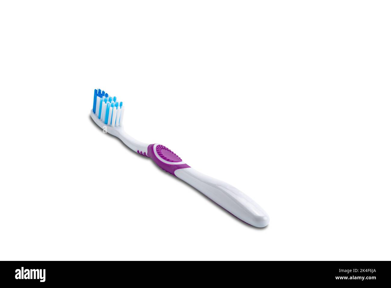 View Of Purple Handle Toothbrush Isolated On White Background With