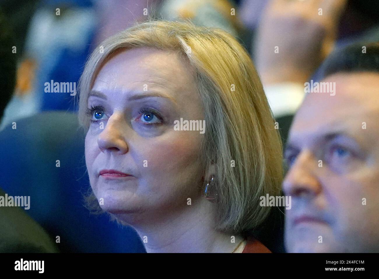 Prime Minister Liz Truss, sits with her husband Hugh O'Leary during the Conservative Party annual conference at the International Convention Centre in Birmingham. Picture date: Sunday October 2, 2022. Stock Photo