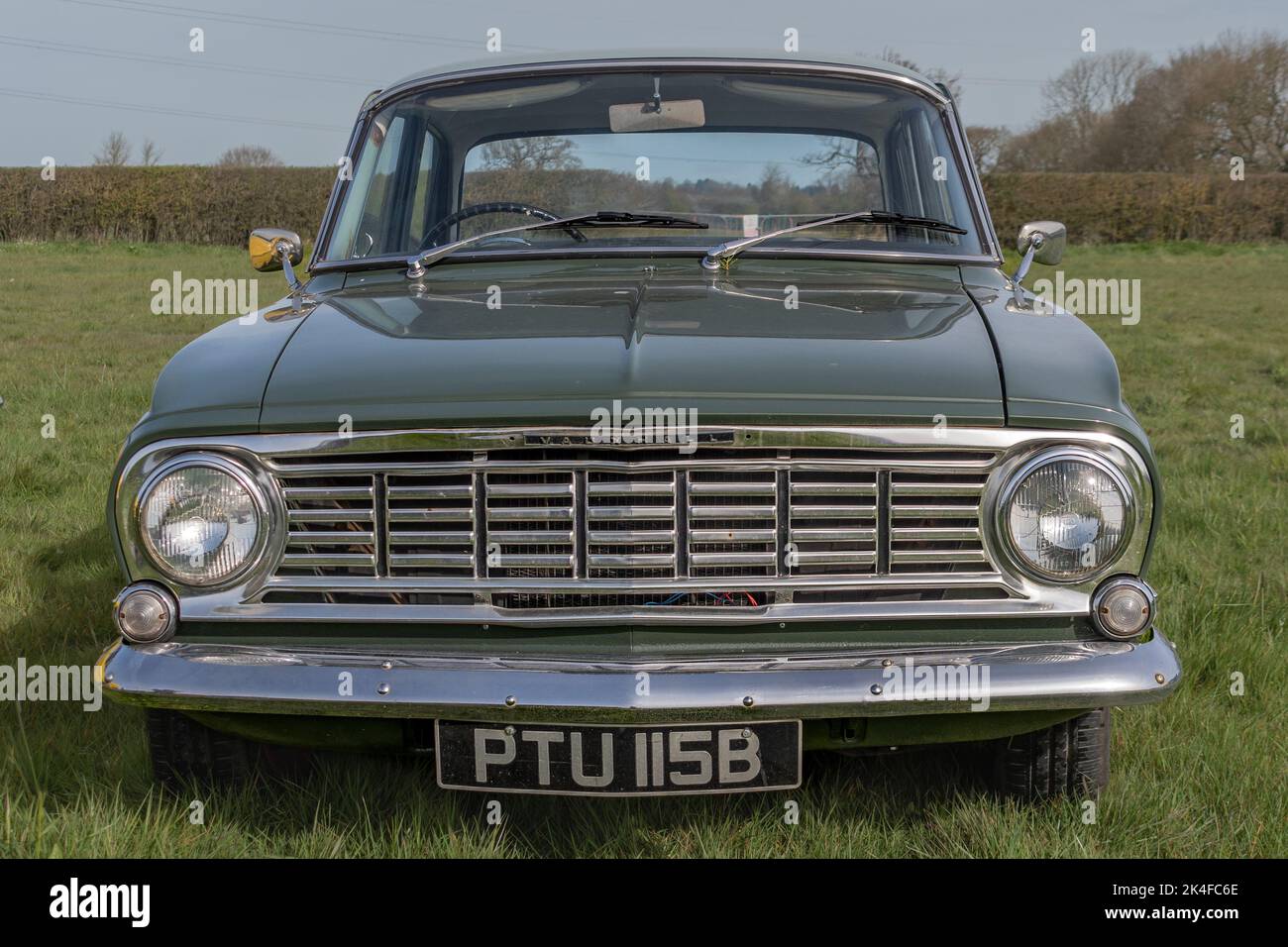 The front grill of a green 1964 Vauxhall Victor Deluxe parked on the grass at a meet of a classic car clubs Stock Photo
