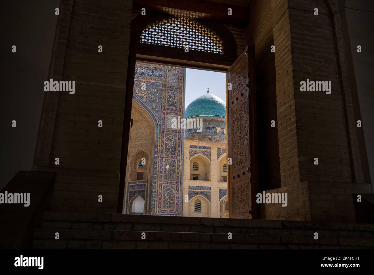 Framed view of Mir-i-Arab Madrasa, Bukhara Old Town Stock Photo