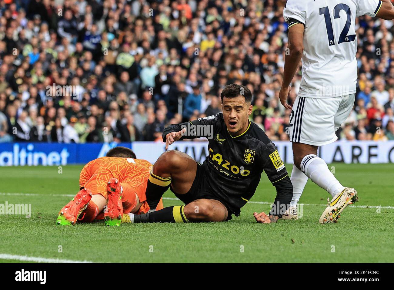 Philippe Coutinho 23 of Aston Villa slides into Illan Meslier 1 of