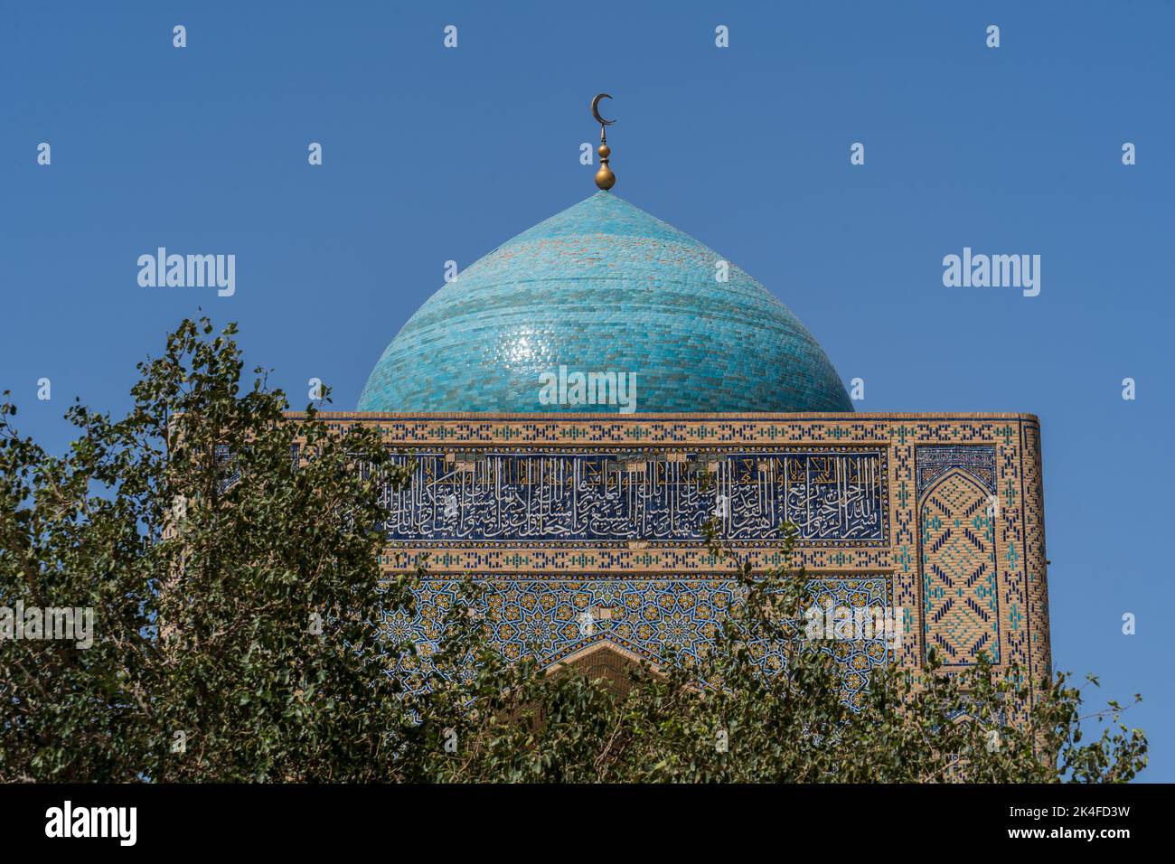 Zoom of blue tiled dome and patterns of Kalan Mosque, Bukhara old town Stock Photo