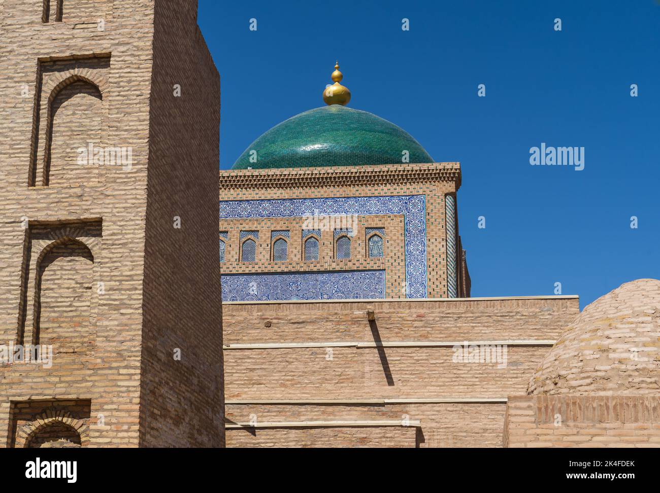 Green Dome Of The Pahlavan Mahmud Mausoleum in Khiva old town. Stock Photo