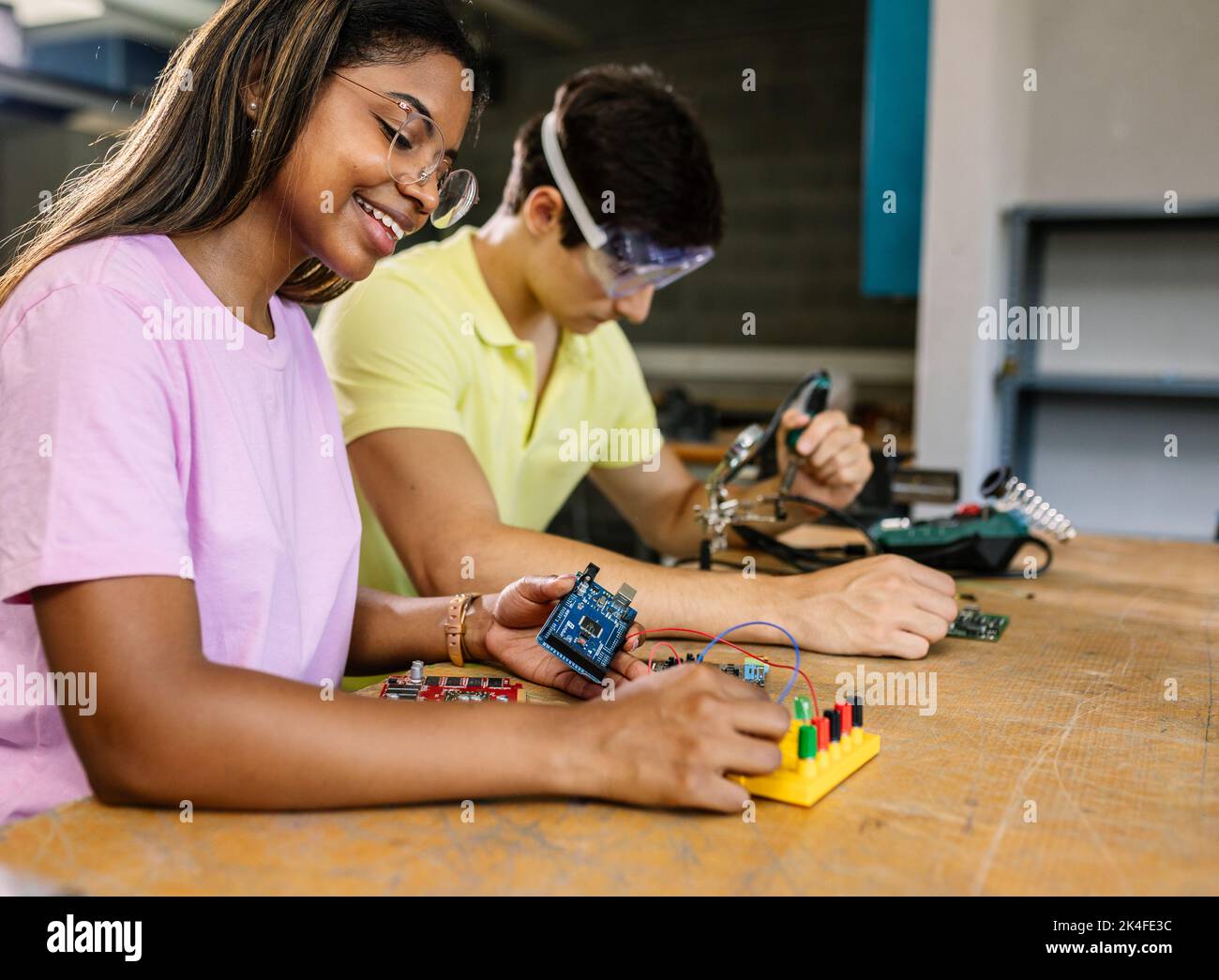 Young high school students learning together at stem robotics class Stock Photo