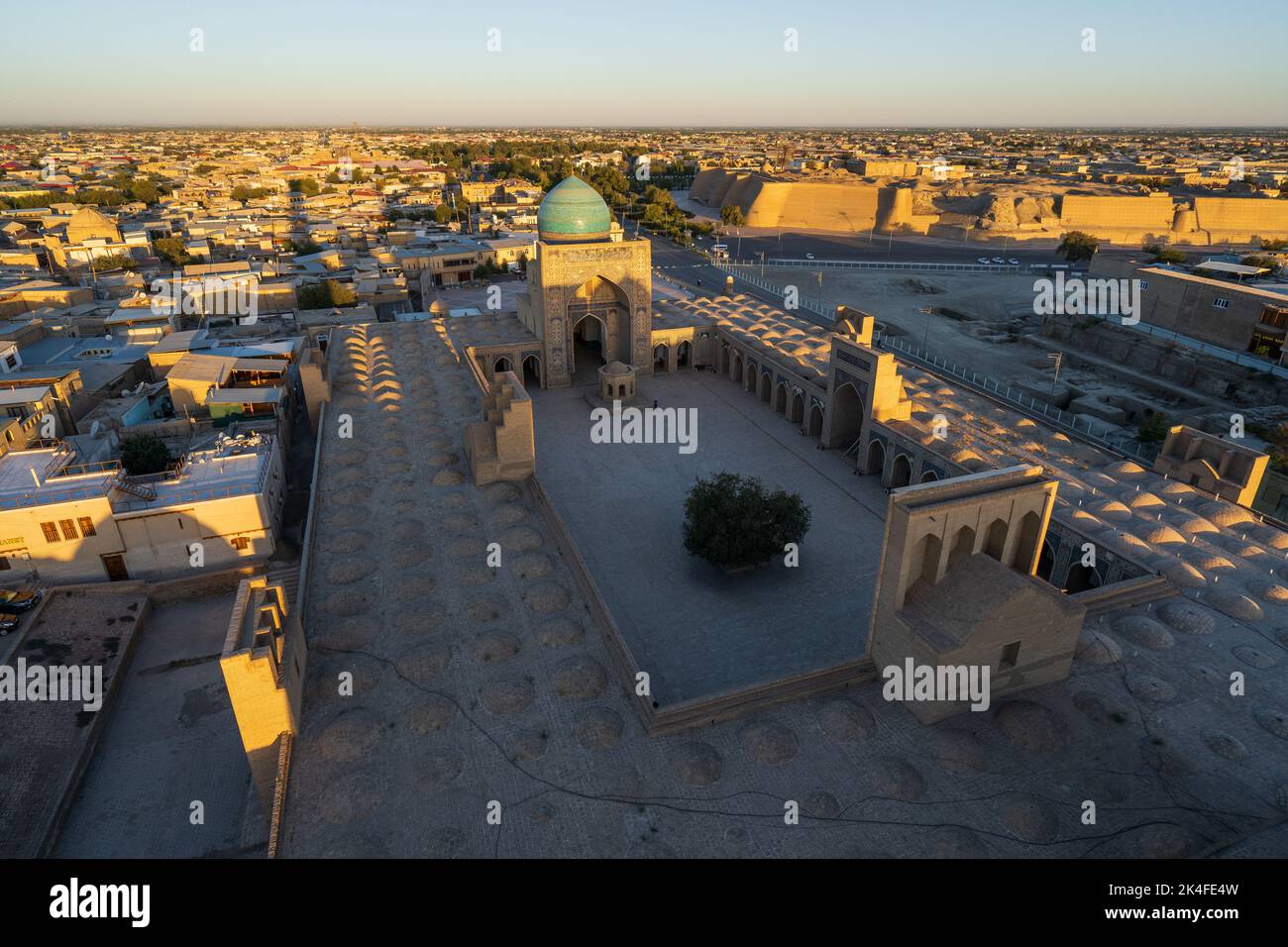 Sunrise view of roof-top vaults of Kalan Mosque from Kalon Minaret Tower, Bukhara Stock Photo