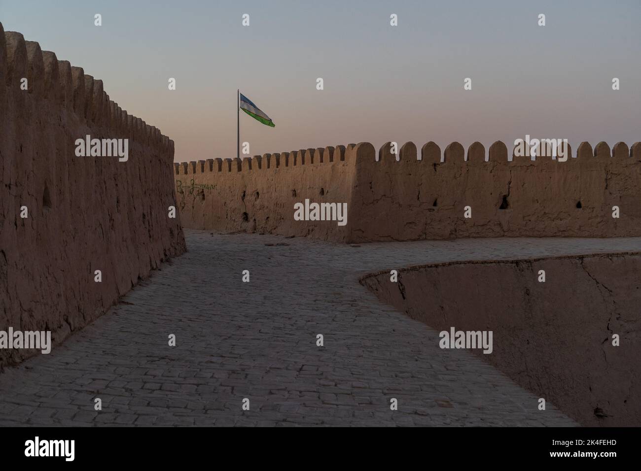 Khiva City Fortress walls at dusk, ramparts Stock Photo