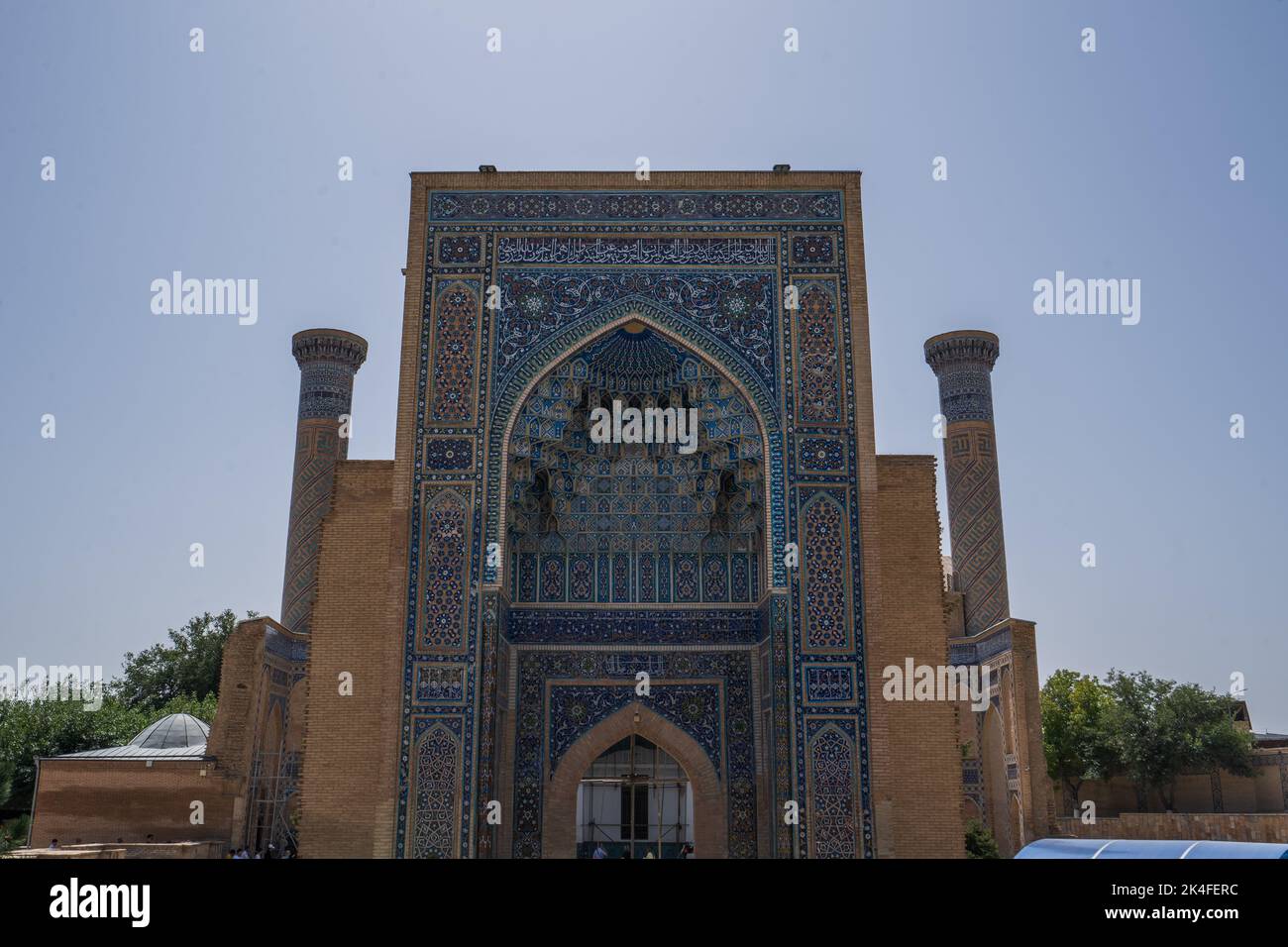 Intricate blue tiles of Gur Emir Mausoleum in bright day in Samarkand Stock Photo