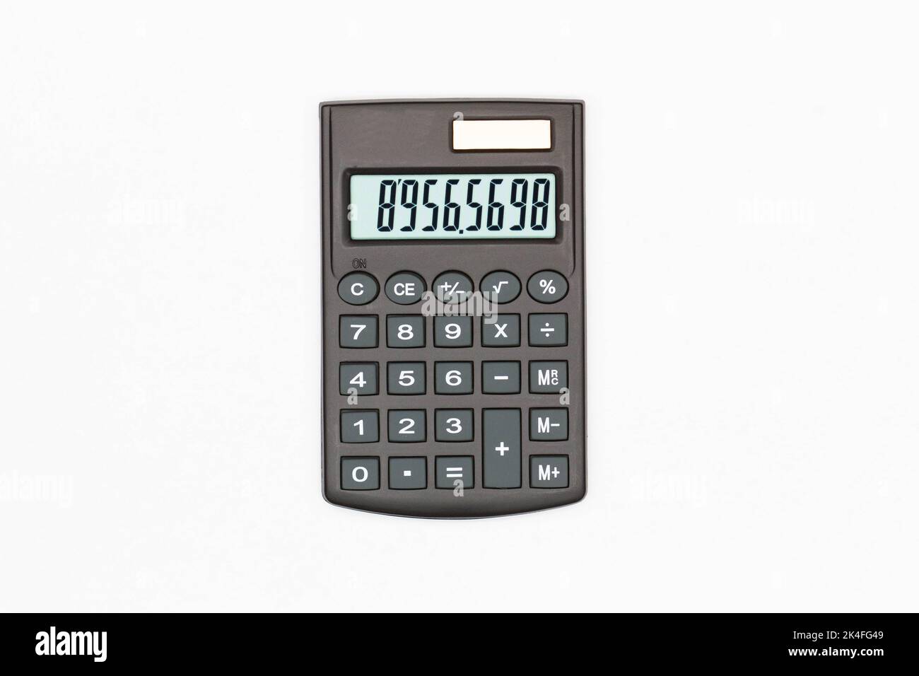 Calculator with big buttons with numbers on the digital screen on a