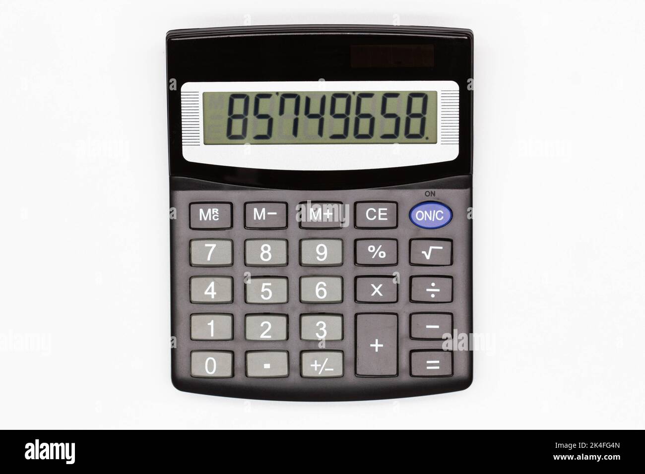 Calculator with big buttons with numbers on the digital screen on a