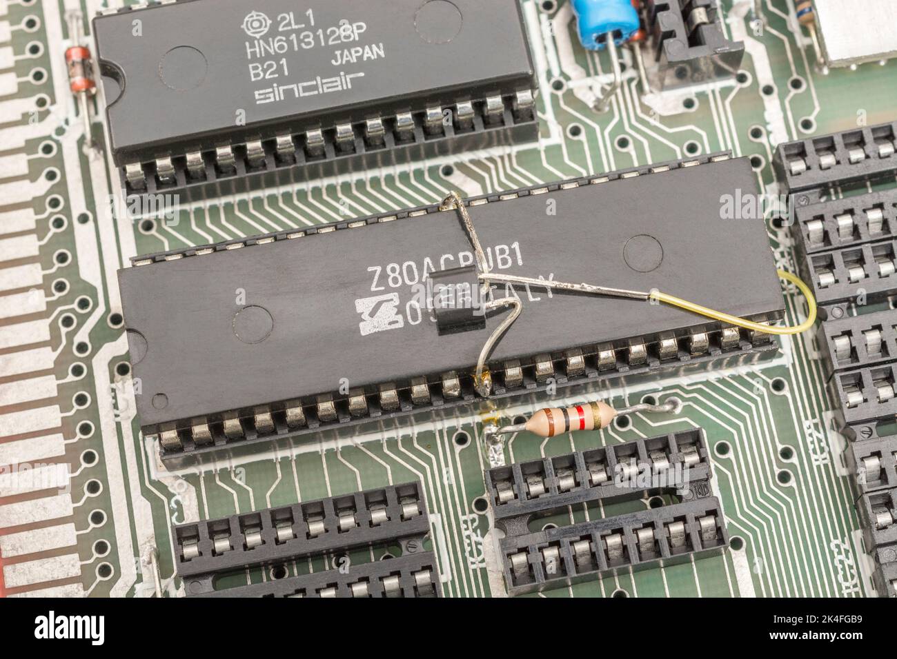Retro computer (1982 Sinzlair ZX Spectrum) motherboard with legendary 40-pin Z80 CPU processor. For semiconductors, microchips, old 1980s computers. Stock Photo