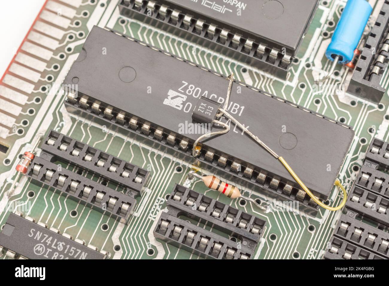 Retro computer (1982 Sinzlair ZX Spectrum) motherboard with legendary 40-pin Z80 CPU processor. For semiconductors, microchips, old 1980s computers. Stock Photo