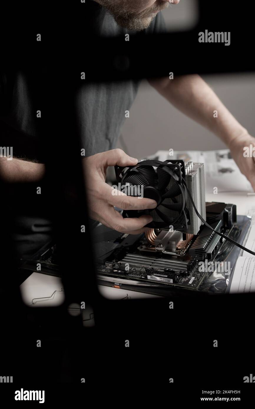 anonymous man calling a PC Stock Photo