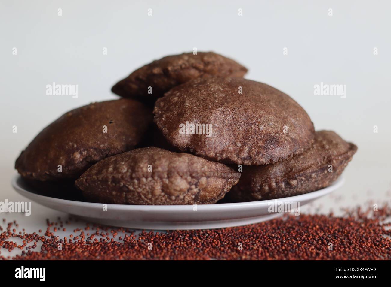Ragi Poori. Deep fried Indian flat bread made of finger millet and wheat flour.This Poori is an