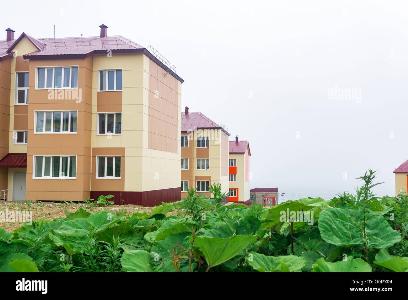 cityscape of Yuzhno-Kurilsk town on the island of Kunashir on a cloudy day Stock Photo