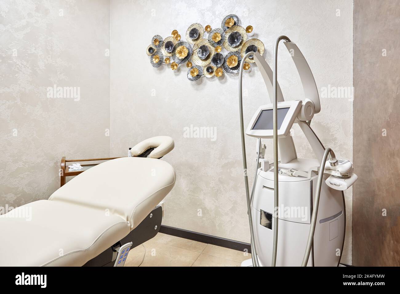 Lipo massage room with lpg massage machine in a beauty clinic. Stock Photo