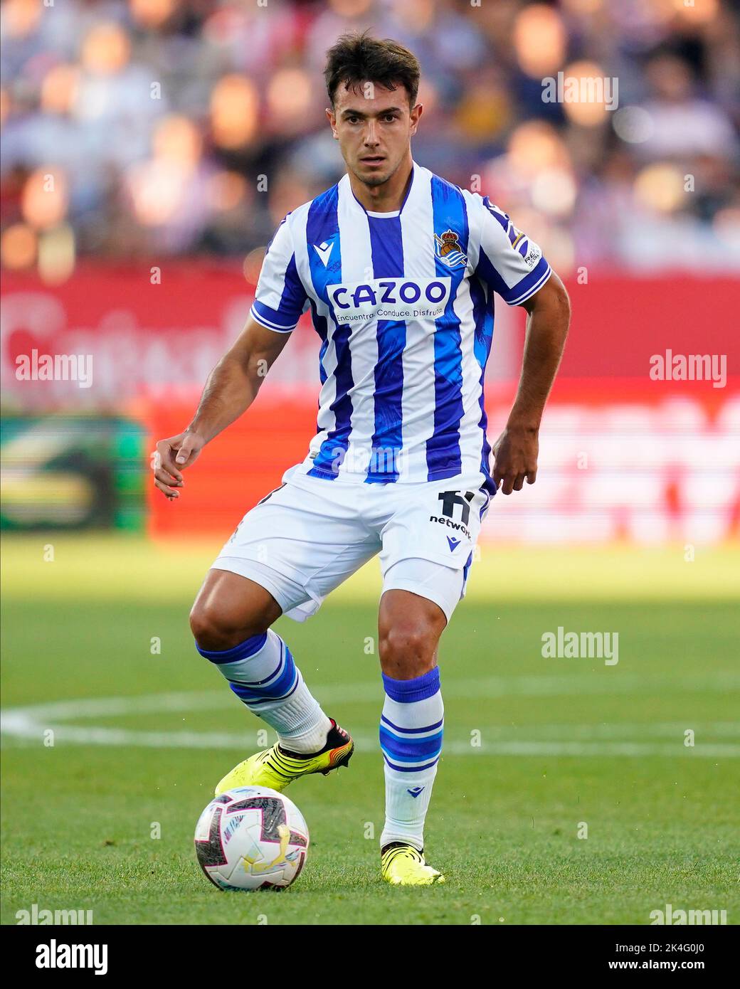 Rodrigo Riguelme Martin Zubimendi of Real Sociedad and Rodrigo Riquelme of Girona FC ...