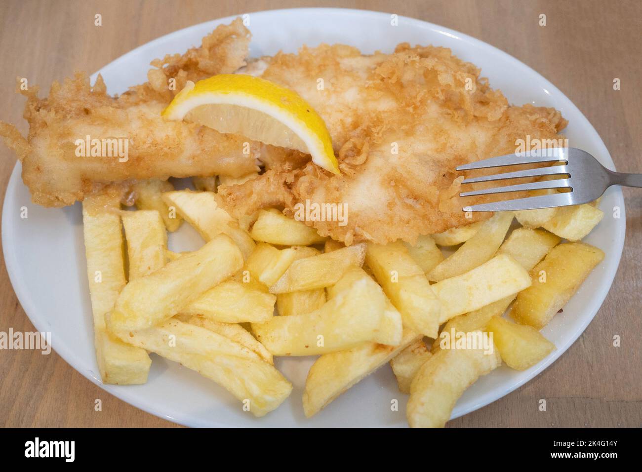 Excellent haddock fish and chips at the famous  Olivers Cafe in Redcar Stock Photo