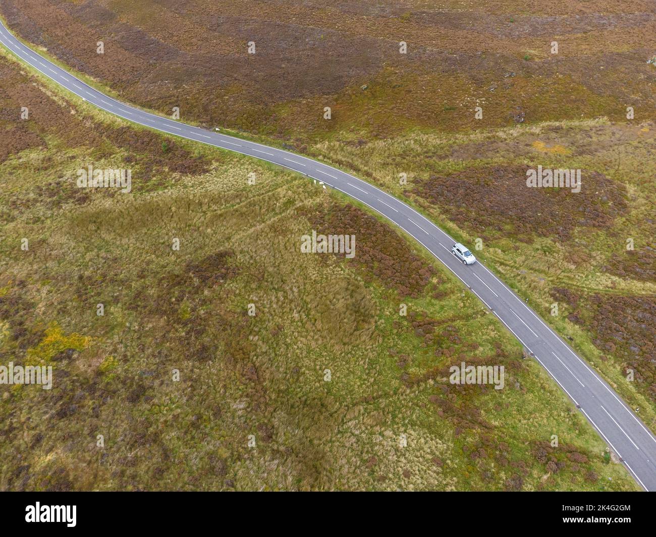 Travelling on a remote moorland road in the UK Stock Photo