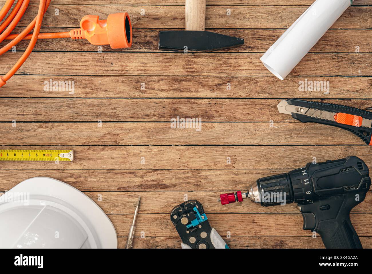 Flat lay composition with different construction tools on wooden background. Stock Photo