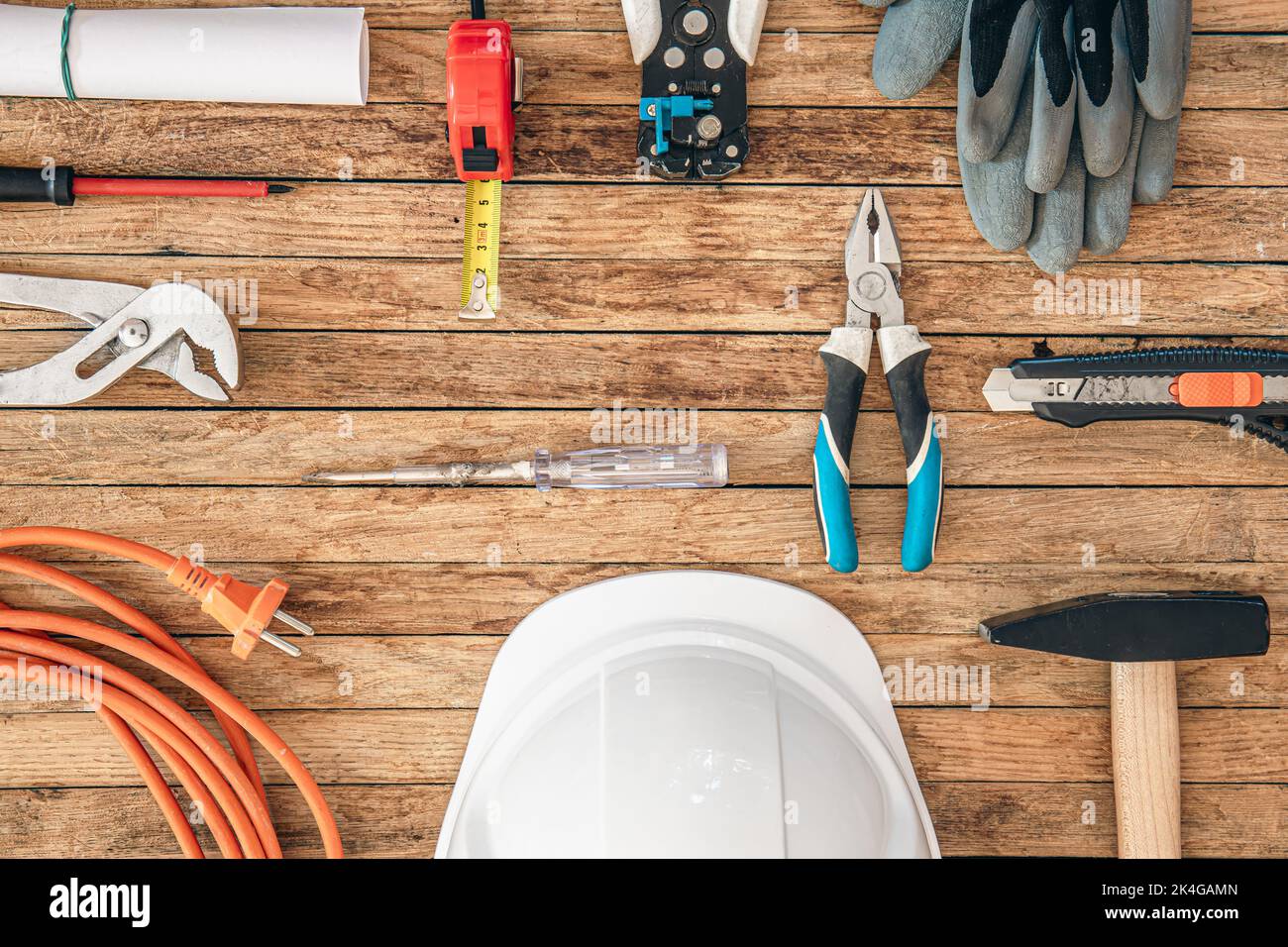 Flat lay composition with different construction tools on wooden background. Stock Photo