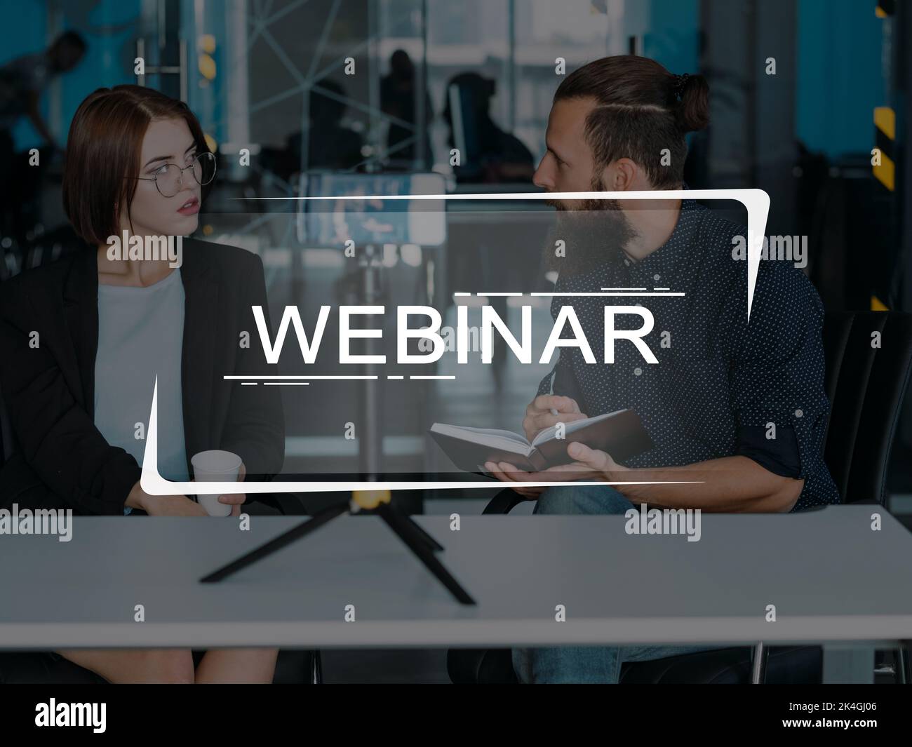 Webinar broadcasting. Business coaching. Professional webcast. Male vlogger streaming online video tutorial interview with successful woman using smar Stock Photo
