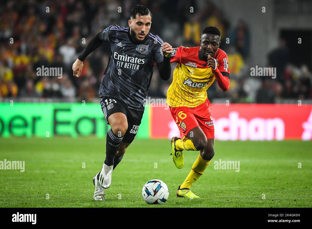 Rayan CHERKI of Lyon and Salis ABDUL SAMED of Lens during the French championship Ligue 1 football match between RC Lens and Olympique Lyonnais (Lyon) on October 2, 2022 at Bollaert-Delelis stadium in Lens, France - Photo Matthieu Mirville / DPPI Stock Photo
