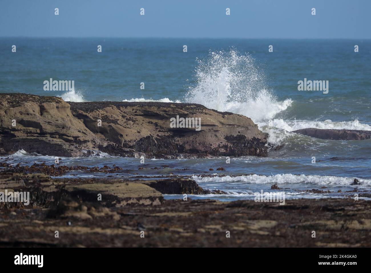 Waves breaking on Rocks Stock Photo