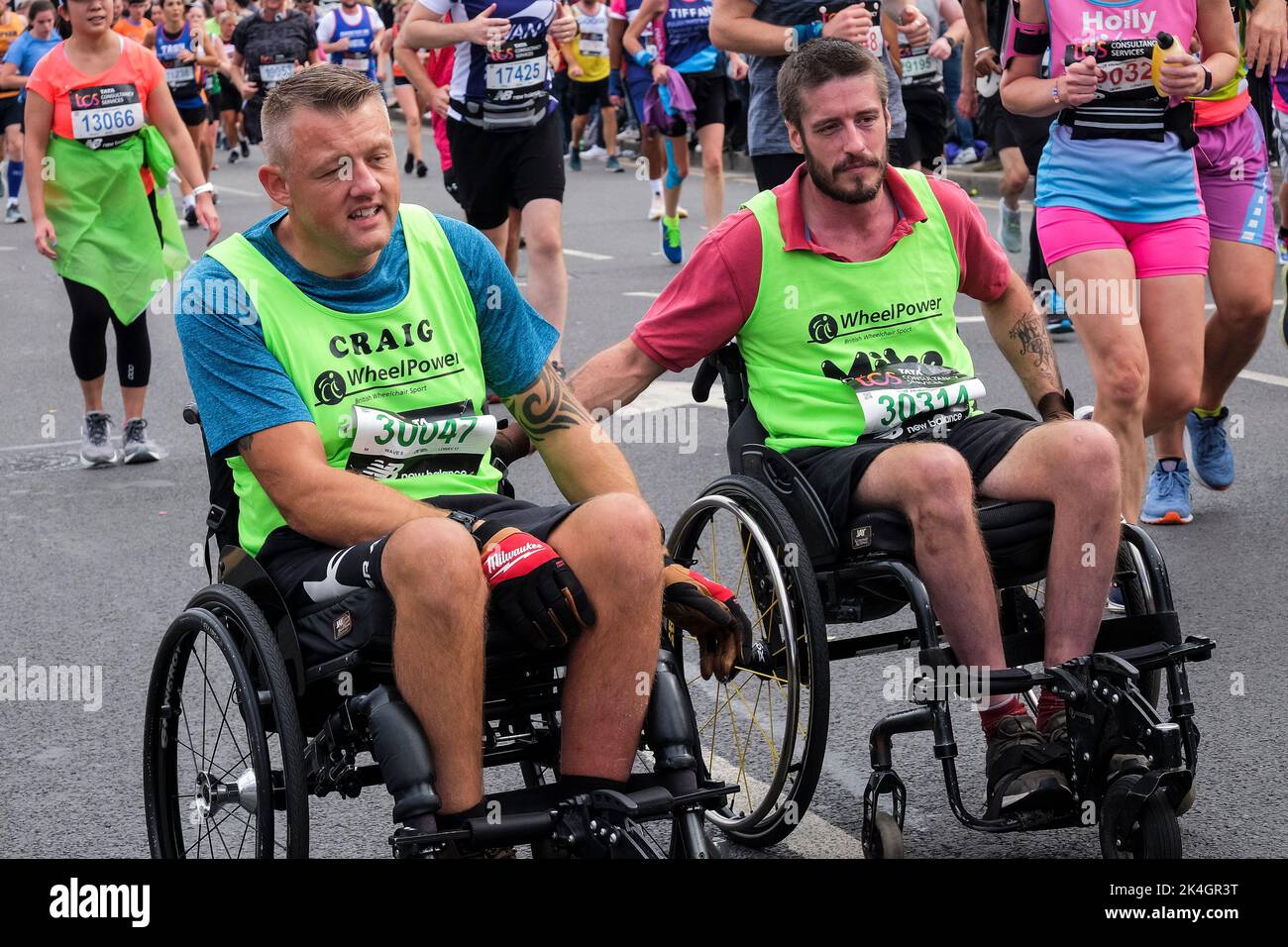 London UK, 2nd October 2022.  More than 40,000 participants take to the streets of the capital for the 42nd London Marathon. The event which attracts elite runners and wheelchair athletes also raises millions of pounds for charity through the participation of club and fitness runners along with those just wanting to take on the 26 mile challenge. Stock Photo
