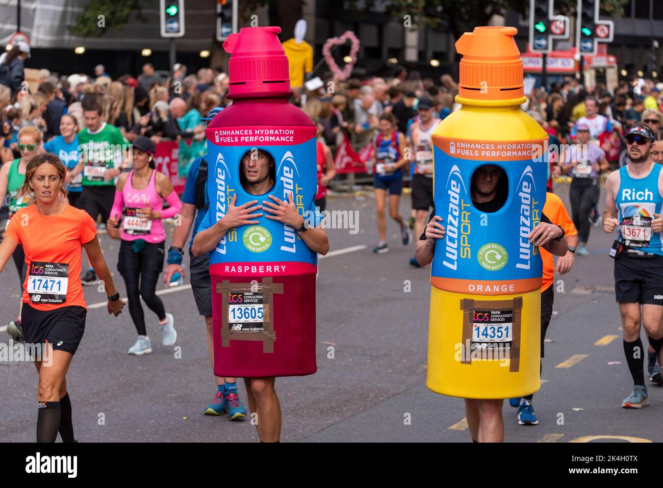 Tom Watson & Sam Bloom wearing Lucozade bottle costumes running in the
