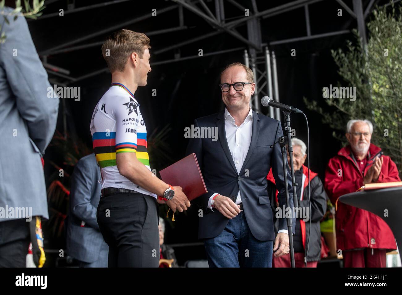 Belgian Remco Evenepoel and Flemish Minister of Education and Animal Welfare and Sports Ben Weyts pictured during the celebration of world champion Evenepoel in Dilbeek and start of a big bike ride to Brussels, Sunday 02 October 2022. 22 years old Evenepoel, from Schepdael, Dilbeek, became world champion after a great season with a win at the Vuelta, first Belgian in 44 years to win a big tour. BELGA PHOTO HATIM KAGHAT Stock Photo