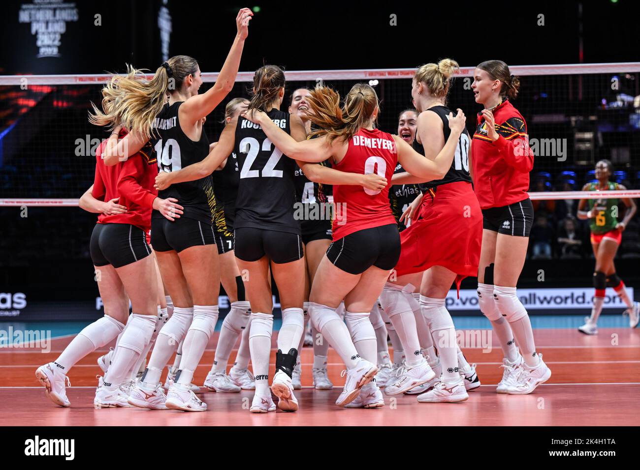Belgian Yellow Tigers celebrate after winning a volleyball game between