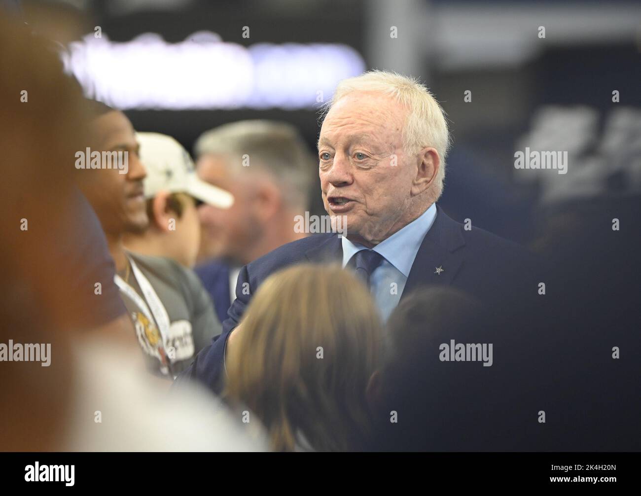 Arlington, Texas, USA. 11th Dec, 2022. Nashville radio producer, EDDIE  GARCIA, on-air radio personality BOBBY BONES, Dallas Cowboys owner,  president, and general manager JERRY JONES, CAITLIN ESTELL, and  writer/producer MIKE DEESTRO pose