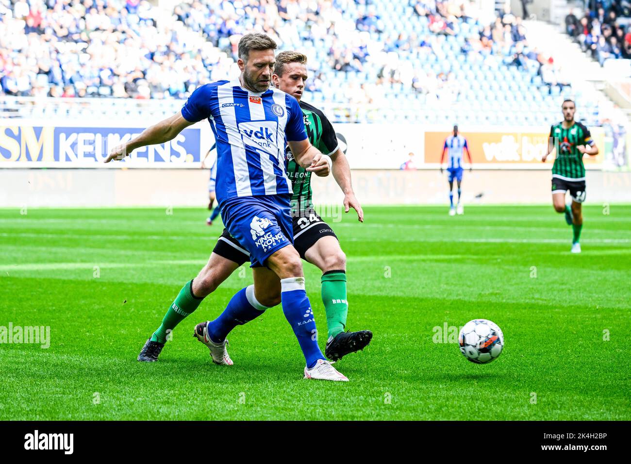 Gent's Laurent Depoitre and Cercle's Thibo Somers pictured in action during a soccer match between KAA Gent and Cercle Brugge, Sunday 02 October 2022 in Gent, on day 10 of the 2022-2023 'Jupiler Pro League' first division of the Belgian championship. BELGA PHOTO TOM GOYVAERTS Stock Photo